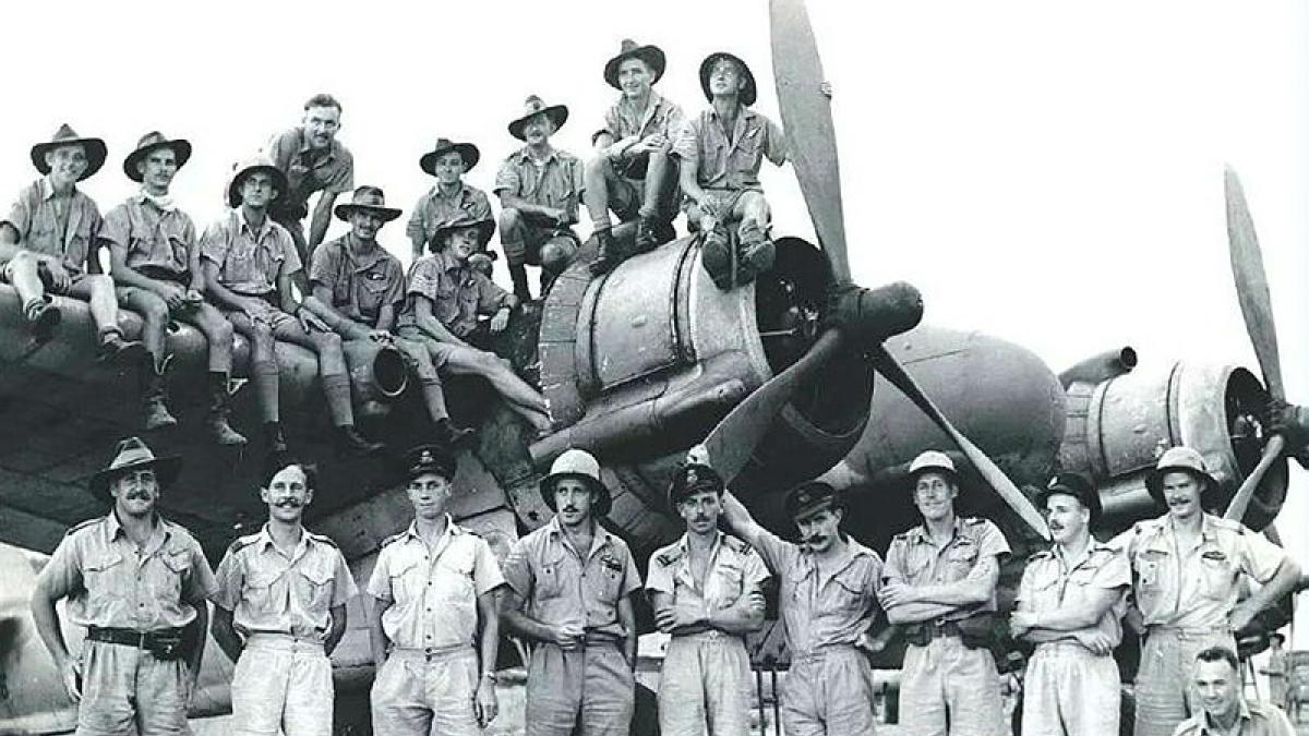 Pilots and observers of 31SQN on and in front of a Squadron Bristol Beaufighter. Photo: AWM / NWA0030