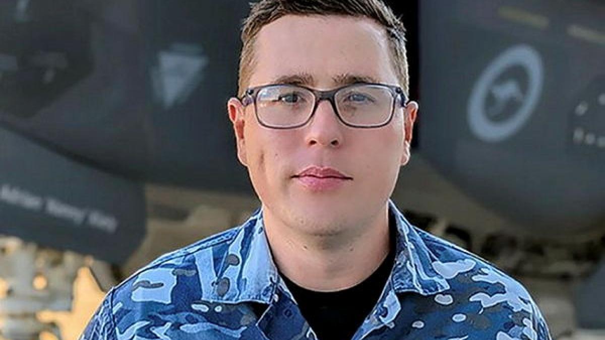 A man in Air Force uniform posing for a portrait.