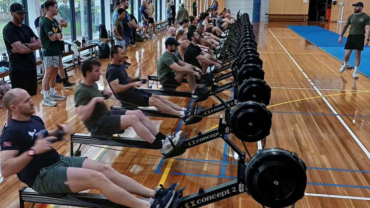 Personnel at RAAF Base East Sale participate in a commemorative workout of the day.