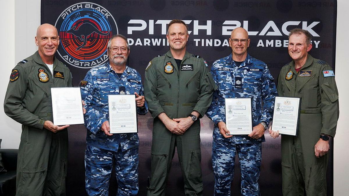 Five military members, four with awards.