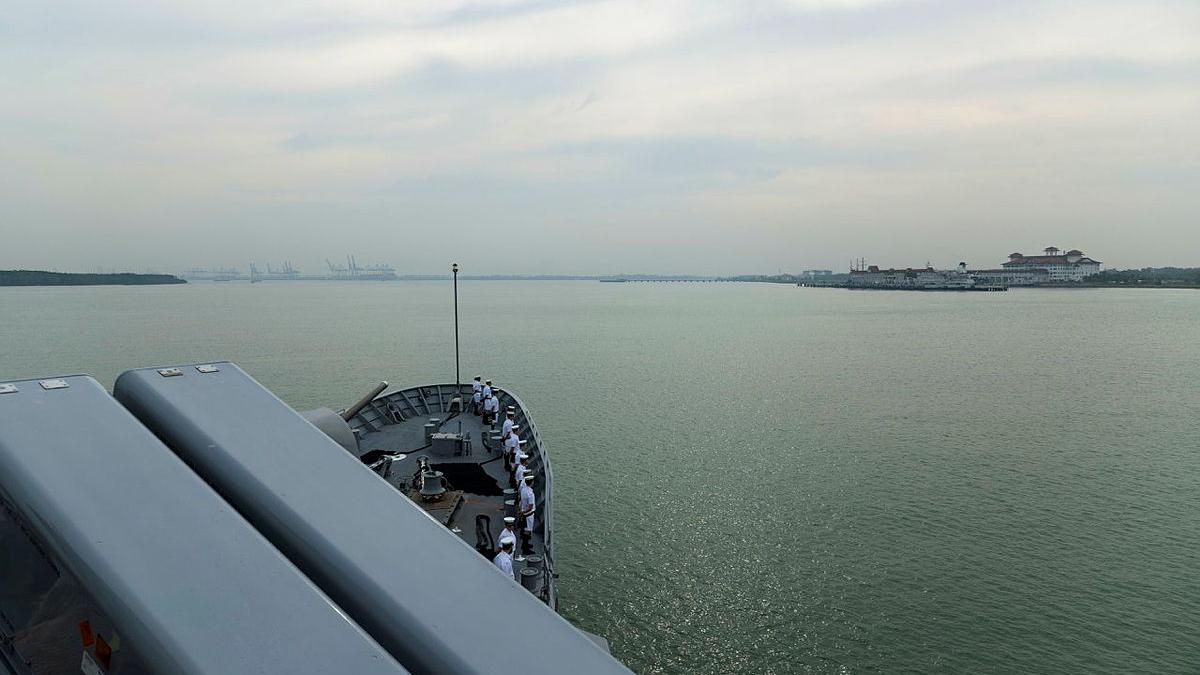 The bow of HMAS Perth steers its way through port Klang in Malaysia.