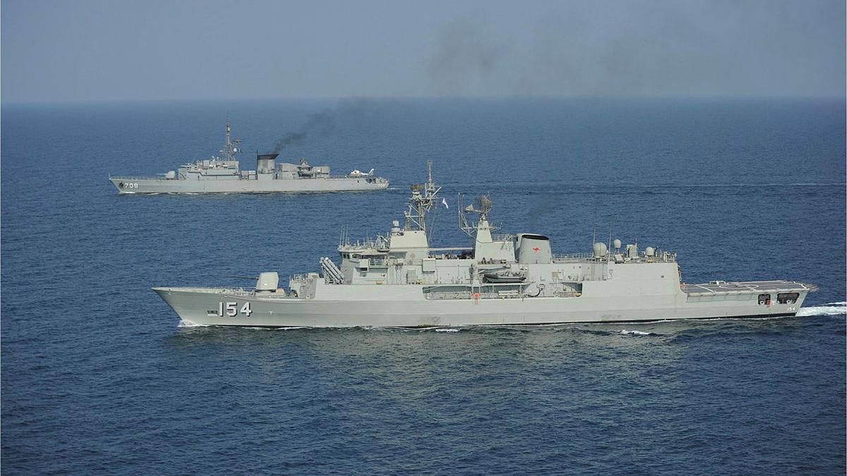 Two ships sailing in the ocean.